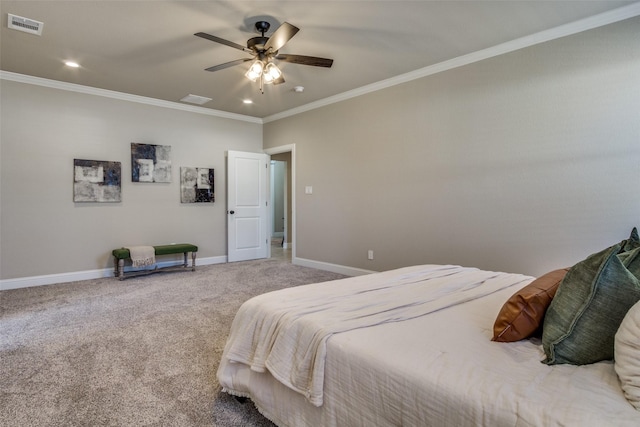 bedroom with visible vents, baseboards, carpet, and ornamental molding