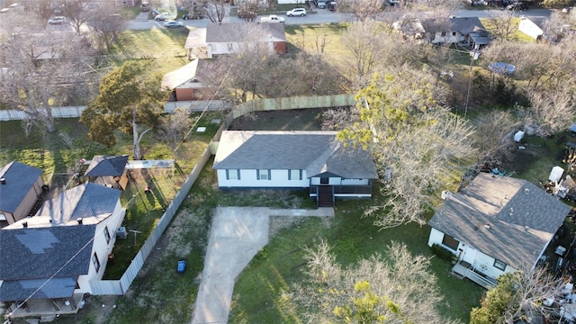 birds eye view of property with a residential view