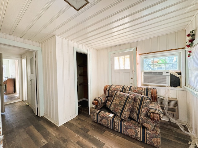 living area featuring dark wood finished floors and cooling unit