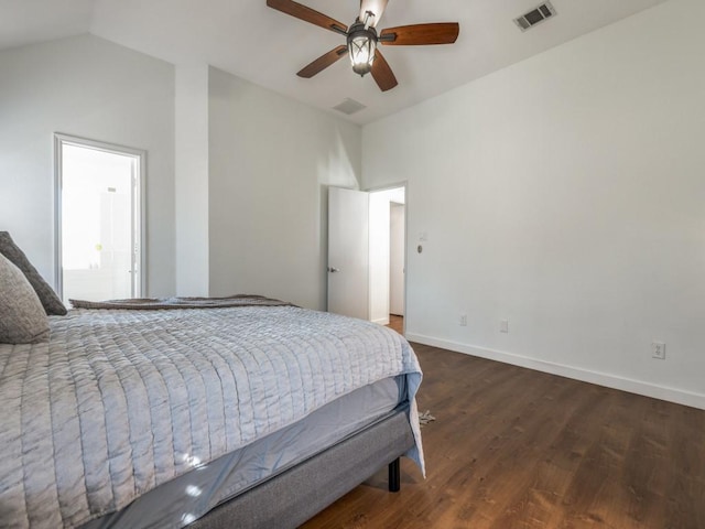 bedroom with wood finished floors, visible vents, baseboards, ceiling fan, and vaulted ceiling