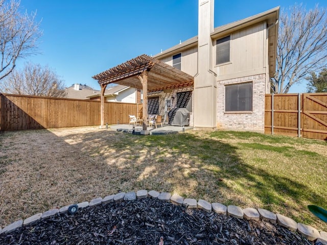 back of property featuring a fenced backyard, a pergola, a patio area, a lawn, and brick siding