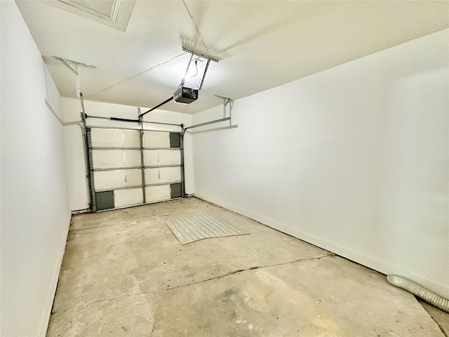 garage featuring baseboards and a garage door opener