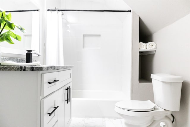 full bathroom featuring shower / bath combo with shower curtain, toilet, marble finish floor, and vanity