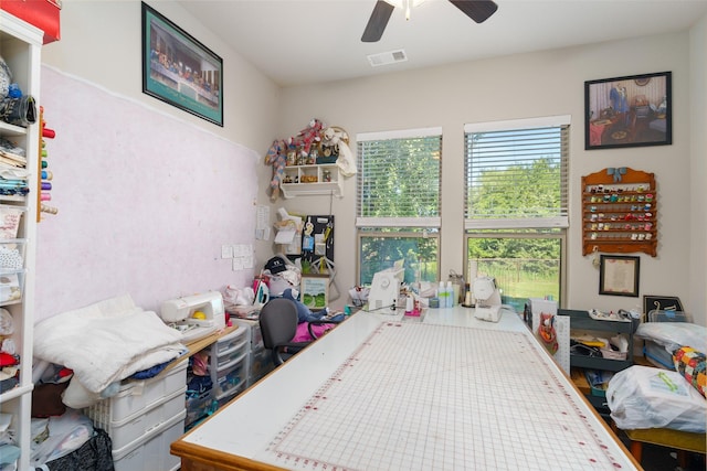 bedroom with visible vents and a ceiling fan