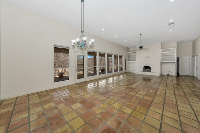 unfurnished living room with tile patterned flooring, visible vents, ceiling fan with notable chandelier, a fireplace, and recessed lighting