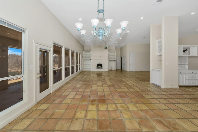 unfurnished living room featuring lofted ceiling, recessed lighting, a fireplace with raised hearth, and light tile patterned flooring