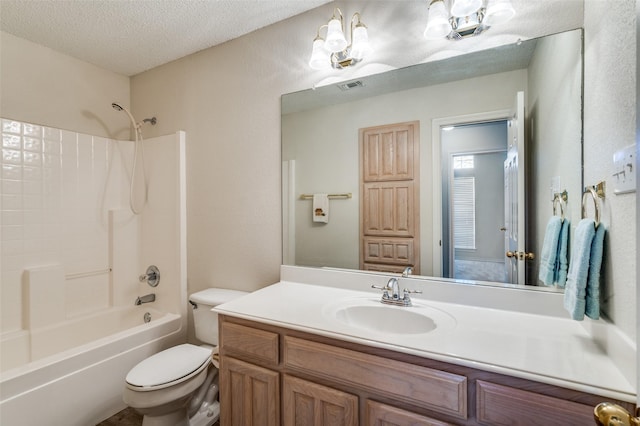 full bath with vanity, visible vents,  shower combination, a textured ceiling, and toilet