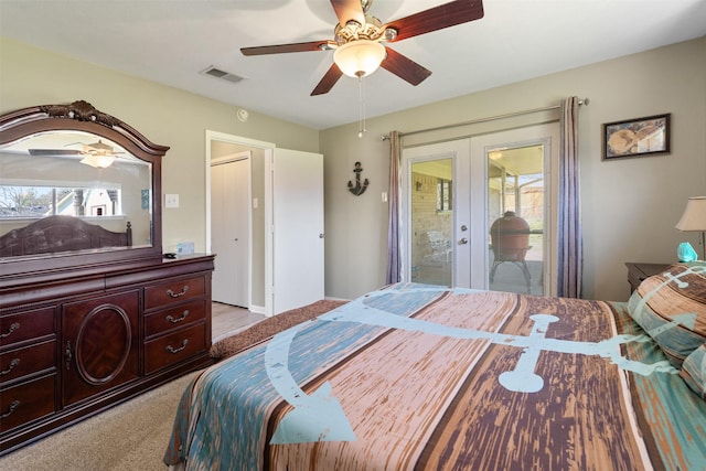 bedroom with light colored carpet, french doors, ceiling fan, and access to outside