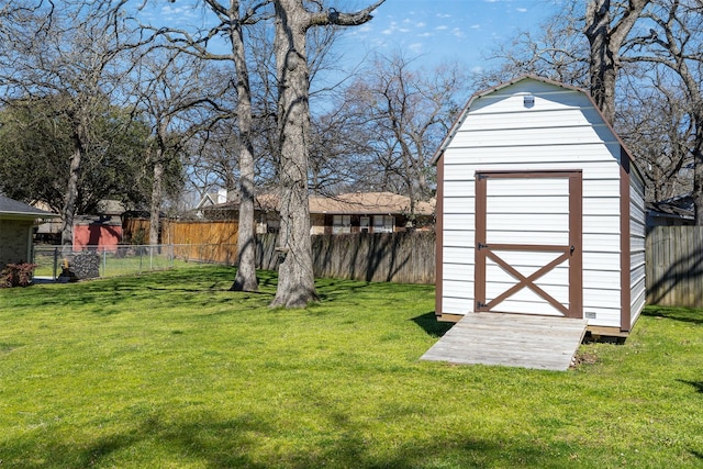 view of shed with a fenced backyard