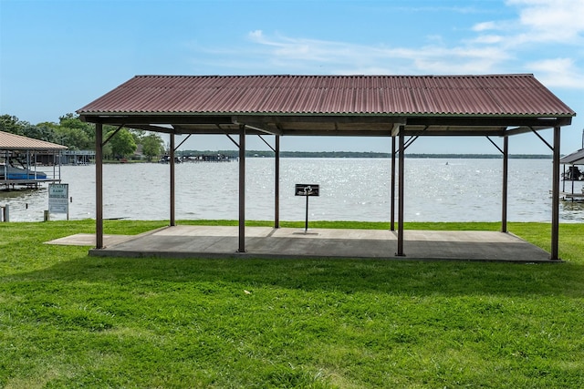 exterior space with a water view