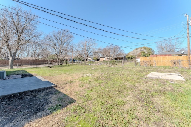 view of yard featuring a patio and fence