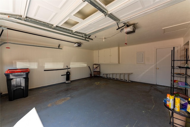 garage featuring a garage door opener