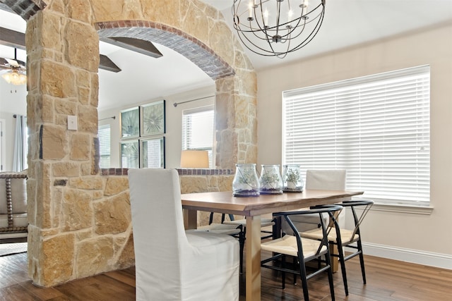 231 Archer Way, Forney, TX 75126 - dining space featuring baseboards, arched walkways, wood finished floors, and ceiling fan with notable chandelier