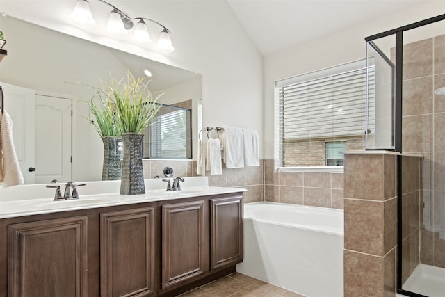 231 Archer Way, Forney, TX 75126 - full bath featuring tile patterned floors, a garden tub, a sink, a shower stall, and lofted ceiling