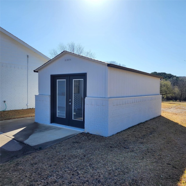 view of outdoor structure featuring french doors