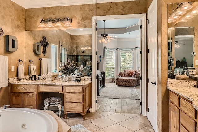 bathroom with connected bathroom, ceiling fan, a whirlpool tub, ornamental molding, and vanity