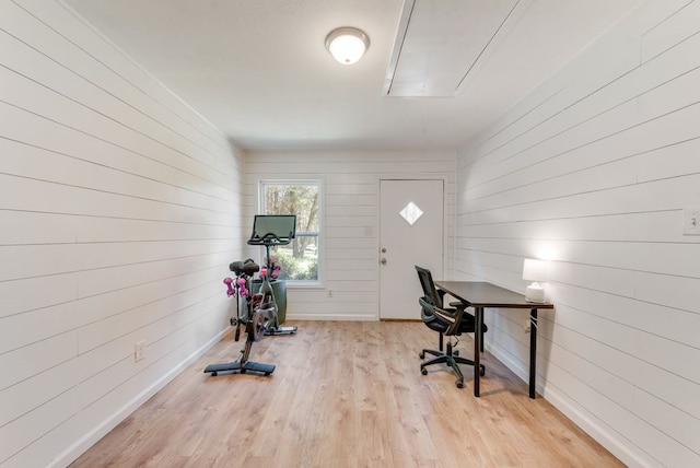 office featuring attic access, wood finished floors, and baseboards