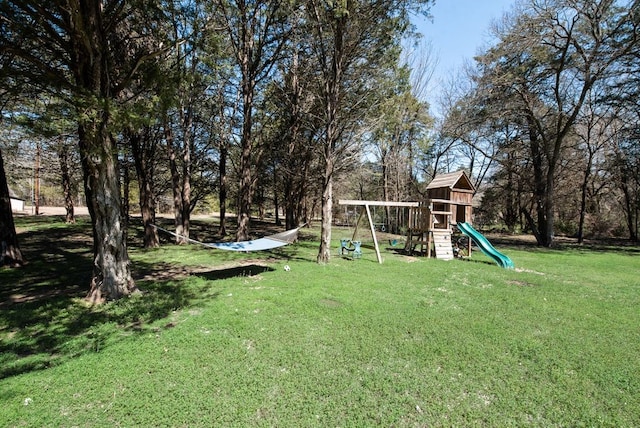 view of play area featuring a lawn