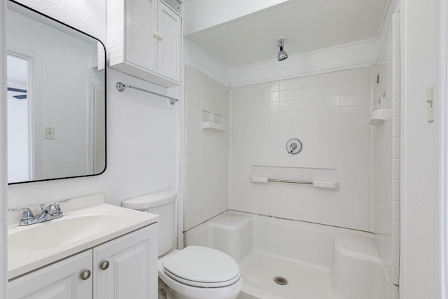 full bathroom with toilet, walk in shower, and vanity