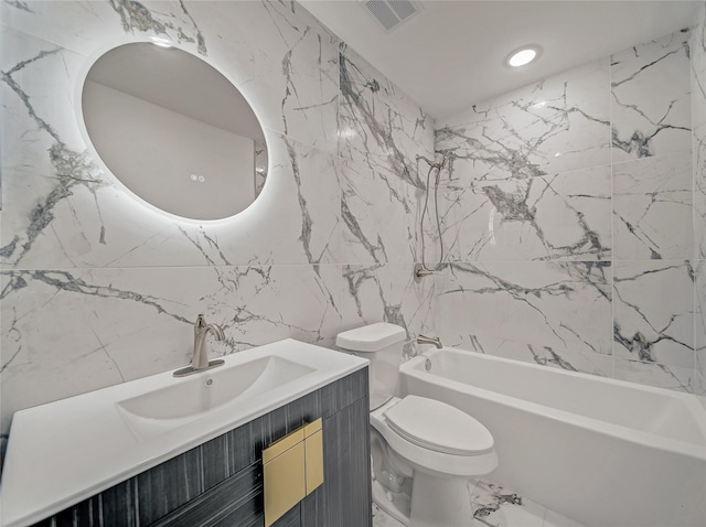 full bath featuring visible vents, shower / washtub combination, toilet, marble finish floor, and vanity