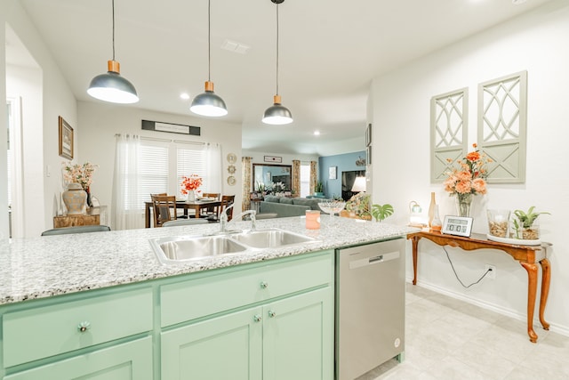 kitchen featuring a sink, decorative light fixtures, dishwasher, and open floor plan