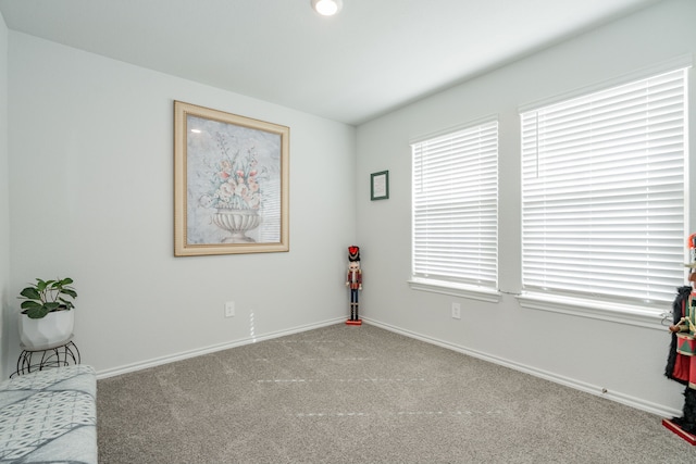 interior space with a healthy amount of sunlight and baseboards