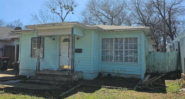 view of front of property with fence