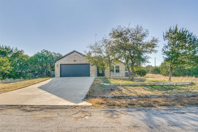 view of front facade with driveway and a garage