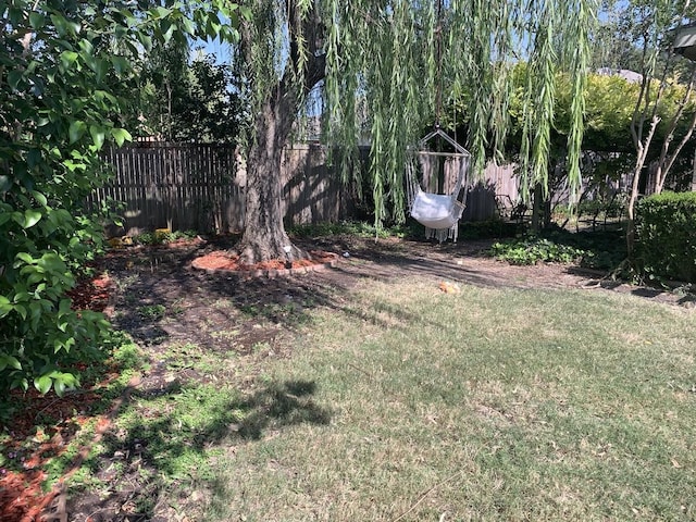 view of yard featuring fence