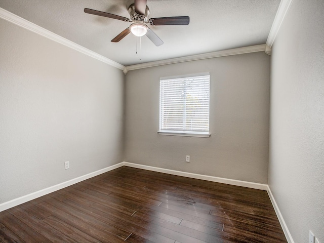 unfurnished room featuring baseboards, crown molding, and hardwood / wood-style flooring