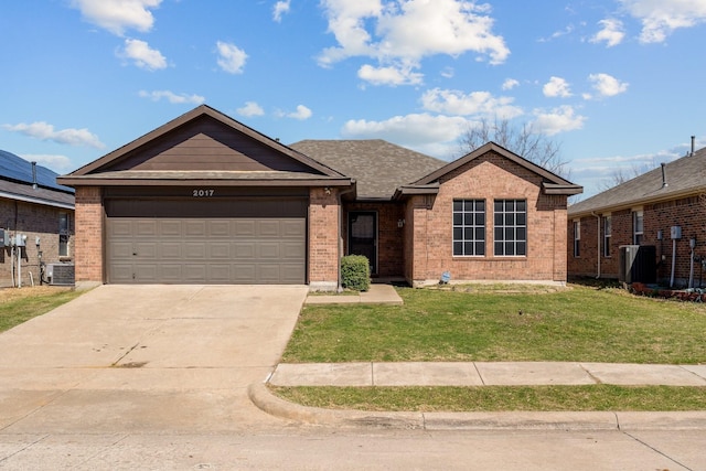 single story home featuring driveway, cooling unit, an attached garage, a front yard, and brick siding