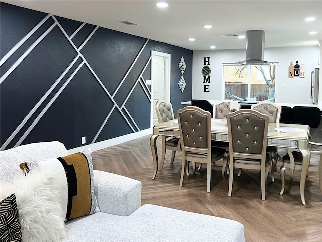 dining space with visible vents and recessed lighting