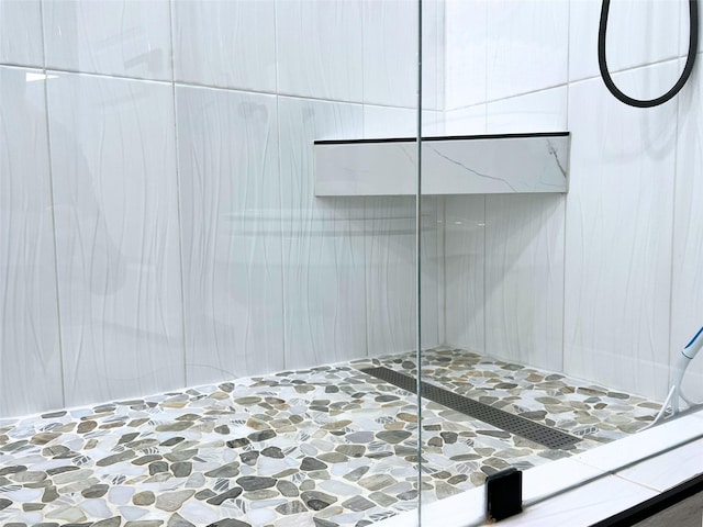 interior space featuring a stall shower