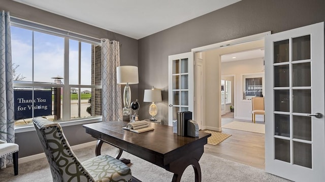 office featuring french doors and baseboards