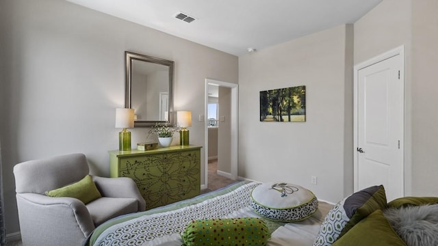 bedroom with visible vents