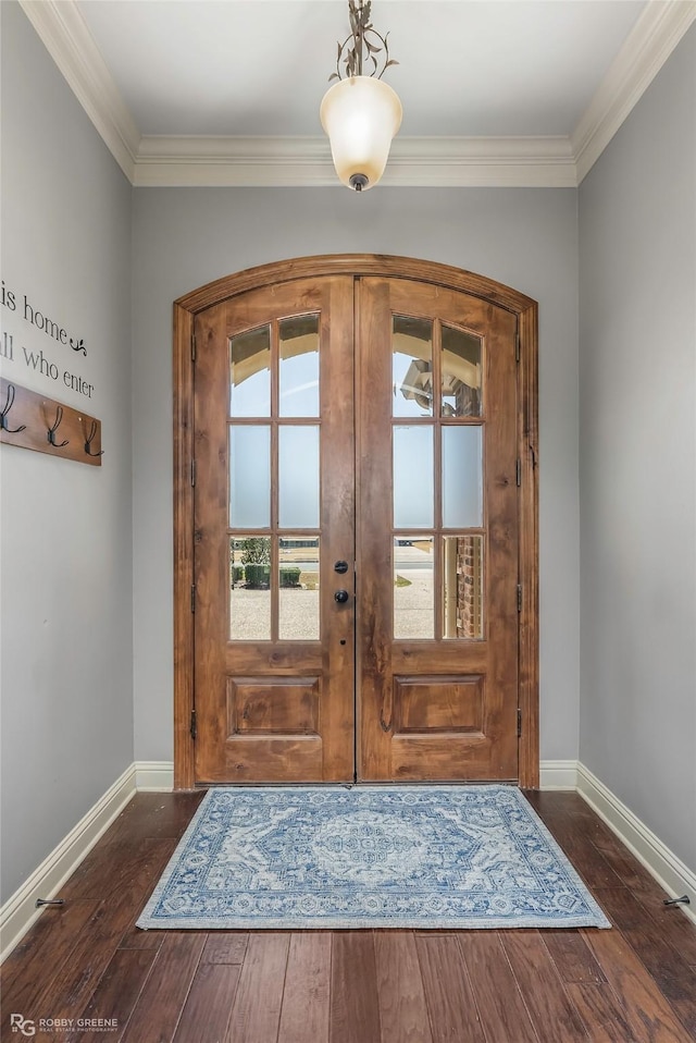 entryway featuring french doors, baseboards, dark wood-type flooring, and crown molding