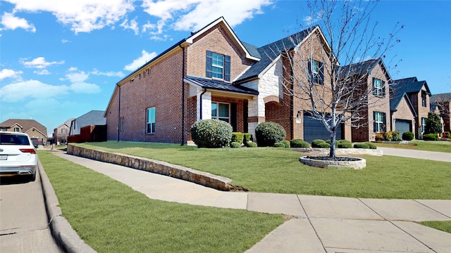 view of front facade with a residential view, brick siding, and a standing seam roof