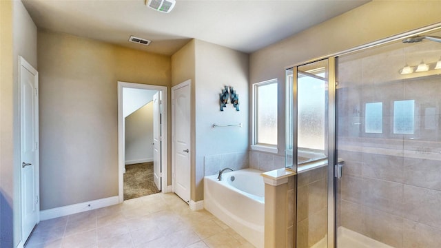 full bath featuring tile patterned flooring, a shower stall, a garden tub, and visible vents