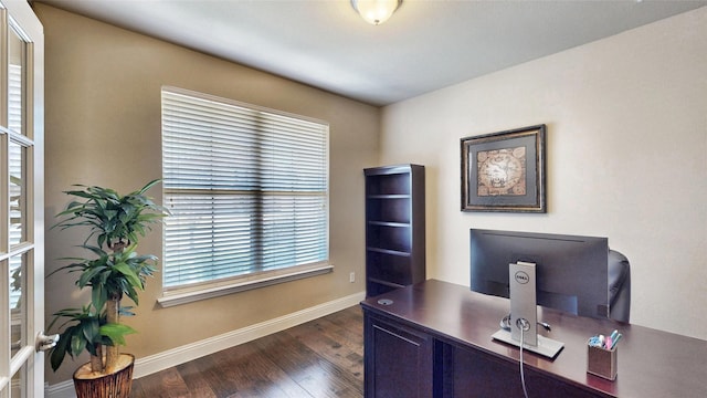 office featuring baseboards and dark wood-type flooring