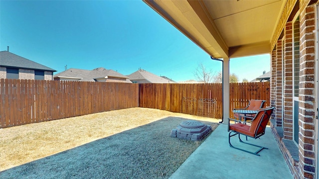 view of patio featuring a fenced backyard