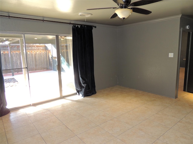 unfurnished room with ceiling fan, light tile patterned floors, visible vents, and ornamental molding