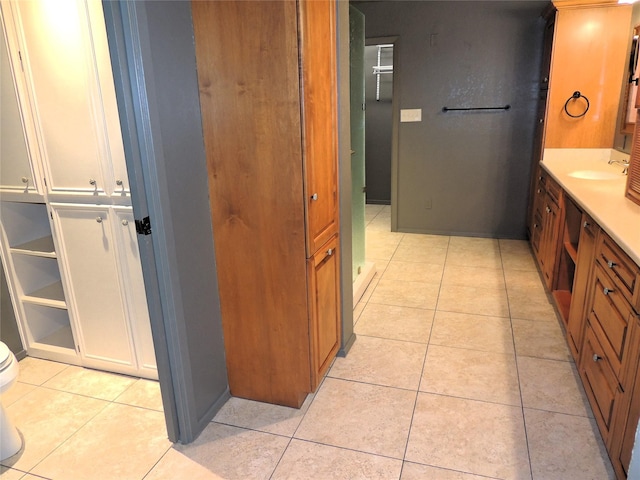 bathroom featuring tile patterned floors and vanity