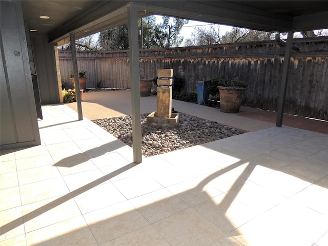 view of patio with fence