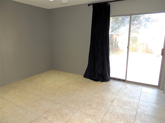 empty room with light tile patterned floors