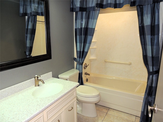 bathroom with tile patterned flooring, toilet, vanity, and shower / bath combo