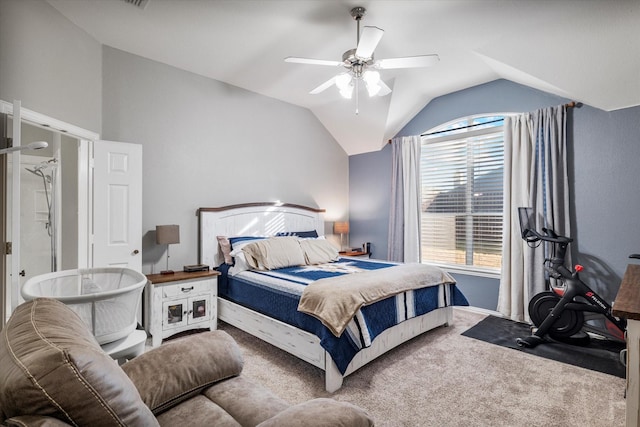 bedroom with vaulted ceiling, carpet flooring, and a ceiling fan