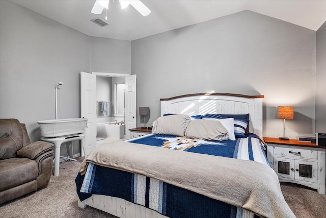 2604 Leisure Ln, Little Elm, TX 75068 - carpeted bedroom featuring vaulted ceiling, ensuite bathroom, and ceiling fan