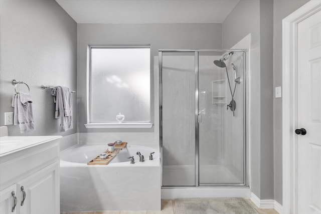 2604 Leisure Ln, Little Elm, TX 75068 - bathroom with a shower stall, vanity, and a garden tub