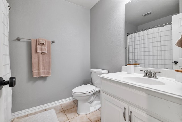 full bath featuring visible vents, toilet, tile patterned flooring, baseboards, and vanity