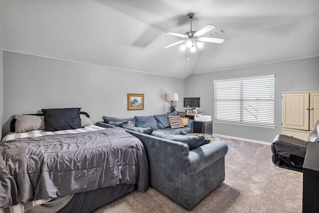 carpeted bedroom with a ceiling fan, lofted ceiling, baseboards, and visible vents